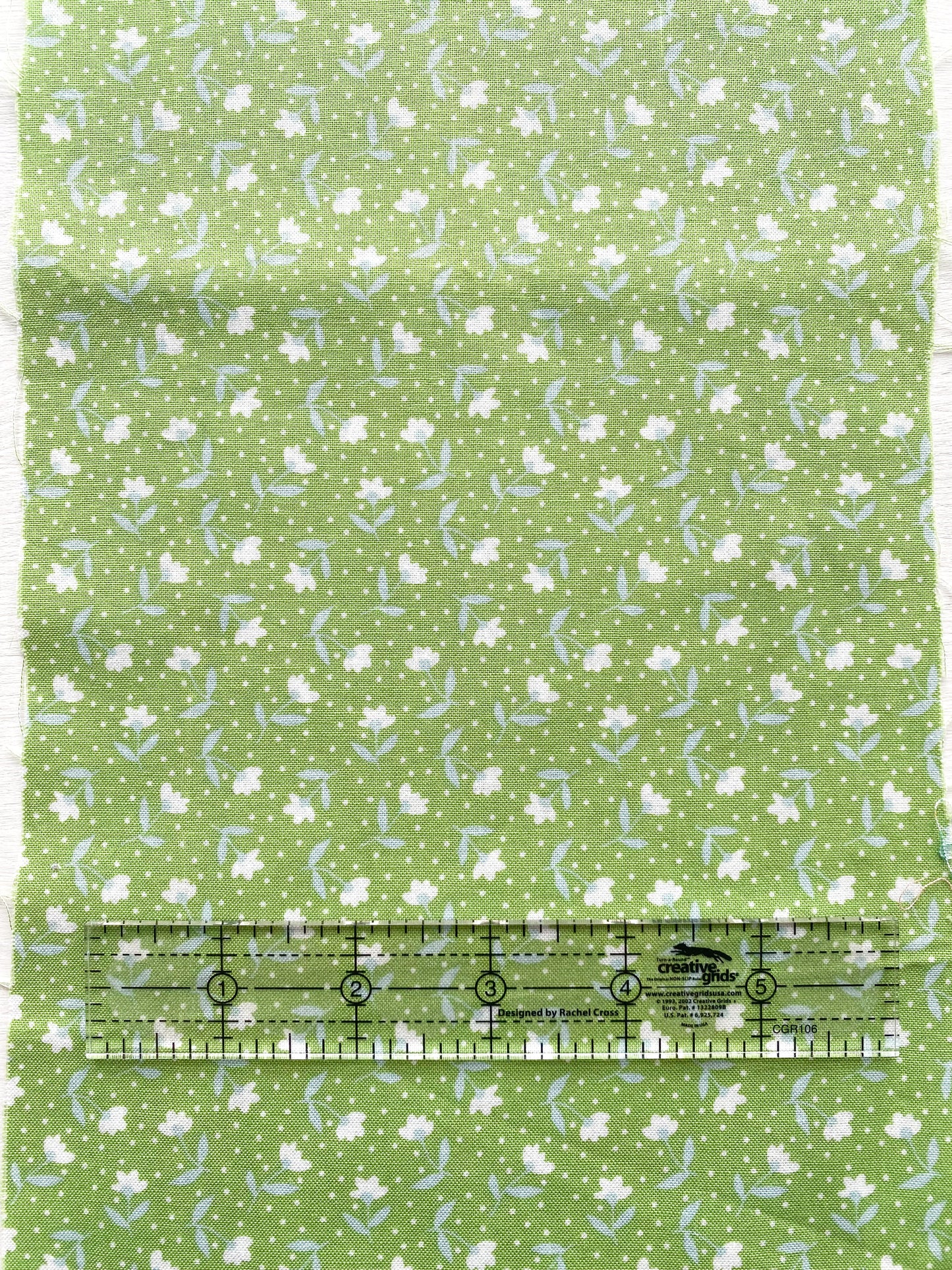 White floral on Green
